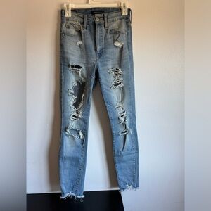 Distressed Aeropostale skinny high rise blue jeans. Size 4. Holes and rips
